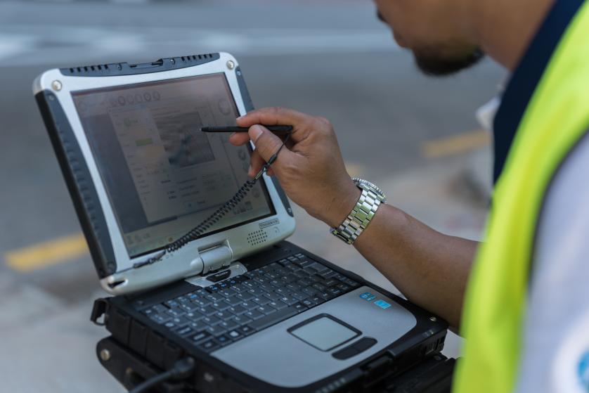 land survey with laptop